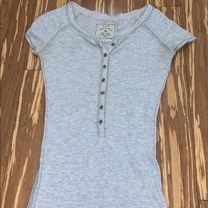 grey v neck shirt